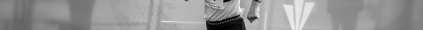 Female athlete sprinting with Bearhug calf support for muscle recovery