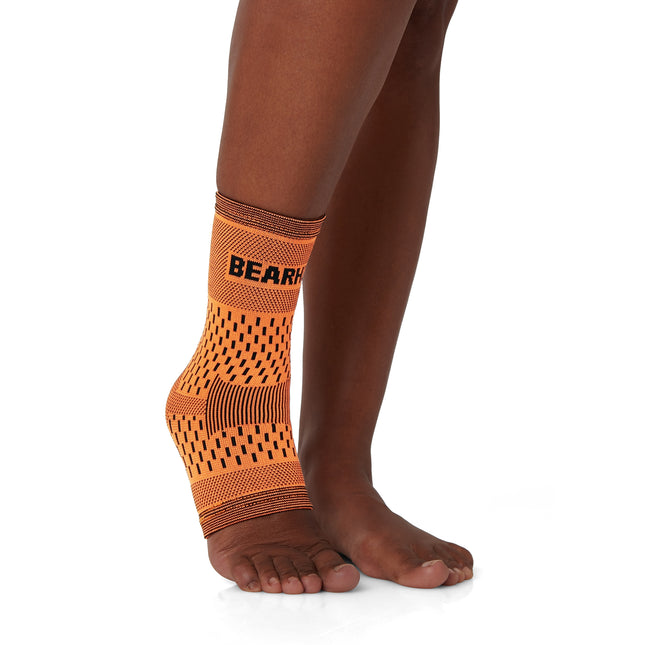 flexing a Bamboo Ankle Compression Support Sleeve For Achilles Tendon And Ankle Sprains