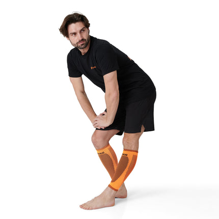Pair of Bearhug Calf Supports worn by a runner