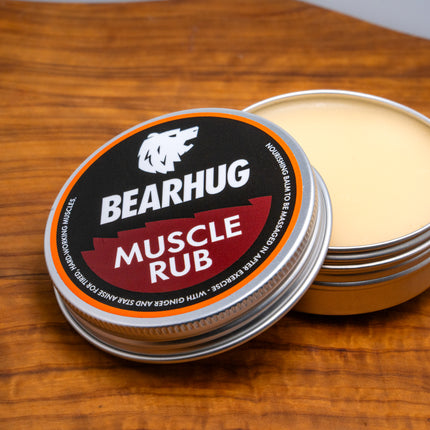 Bearhug Muscle Rub 60g tin angled view, dark red label